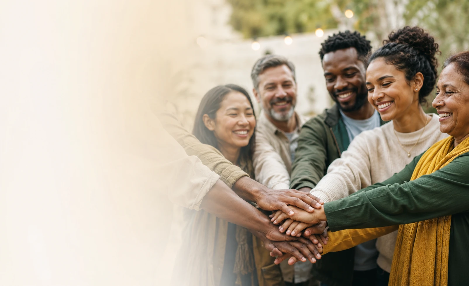 People placing hands together in collaboration